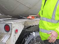 ready-mix truck claining with Orange-Crete brushes